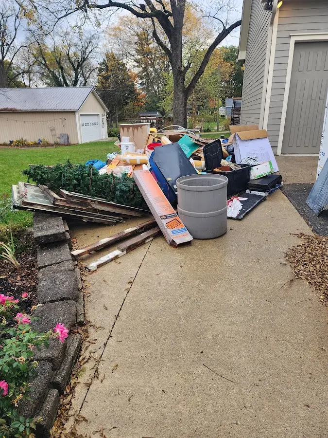 Dumpster being loaded with debris for Residential Dumpster Rental in Lake Havasu City